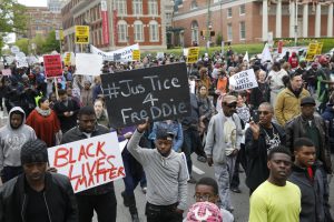Protesters are gathered for a rally to protest the death of Freddie Gray who died following an arrest in Baltimore